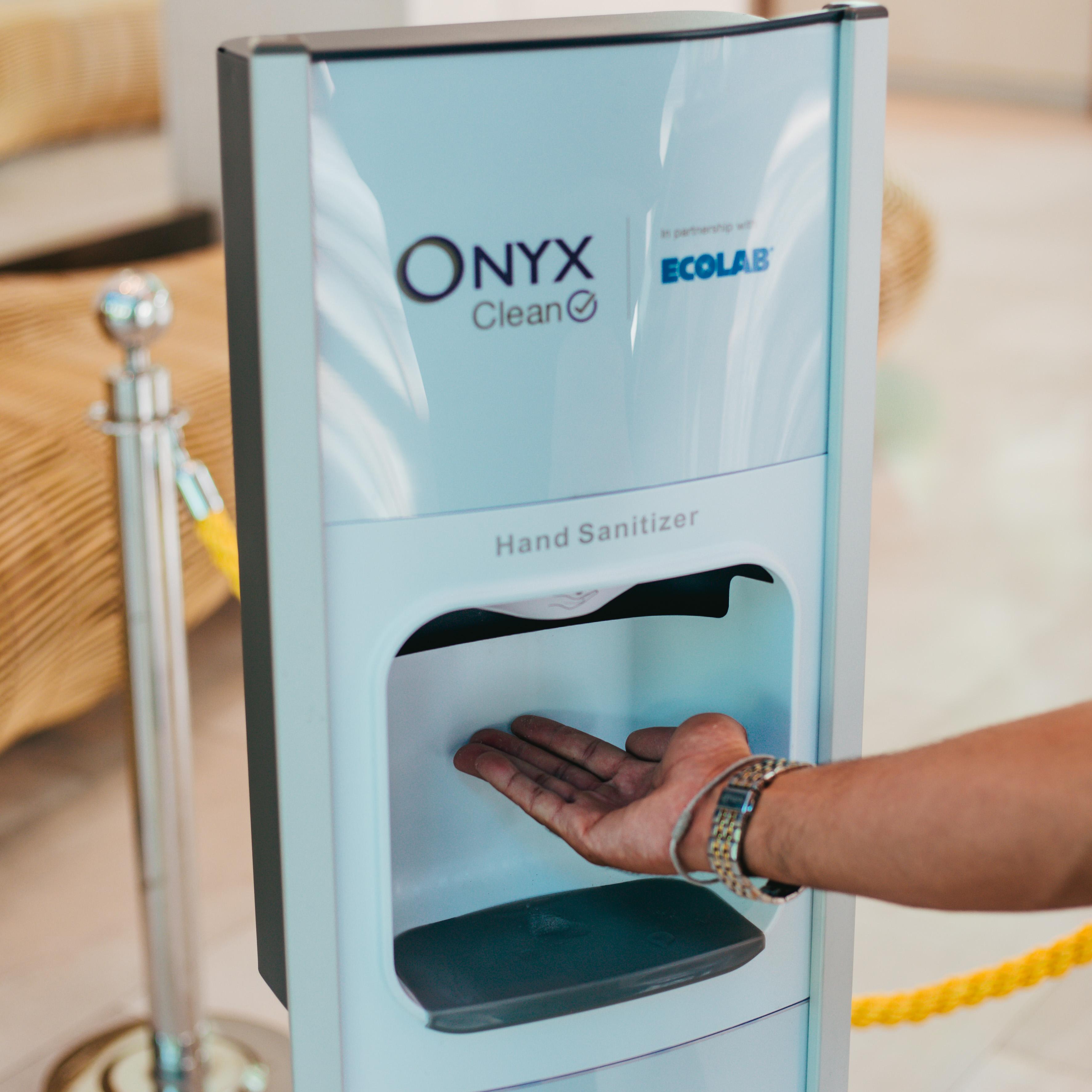 Amari Pattaya Hotel Exterior foto A hand sanitizer dispenser